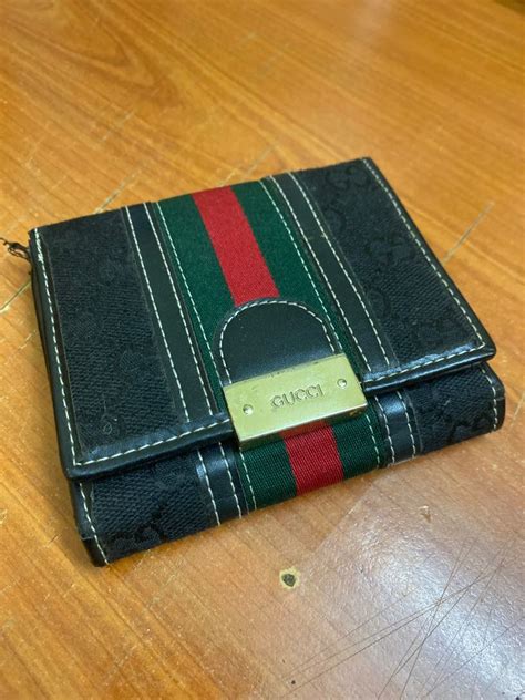 gucci gold wallet|fake Gucci wallet.